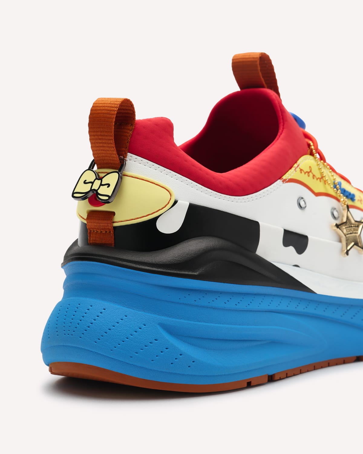 Colorful sneaker with cartoon character design on a white background