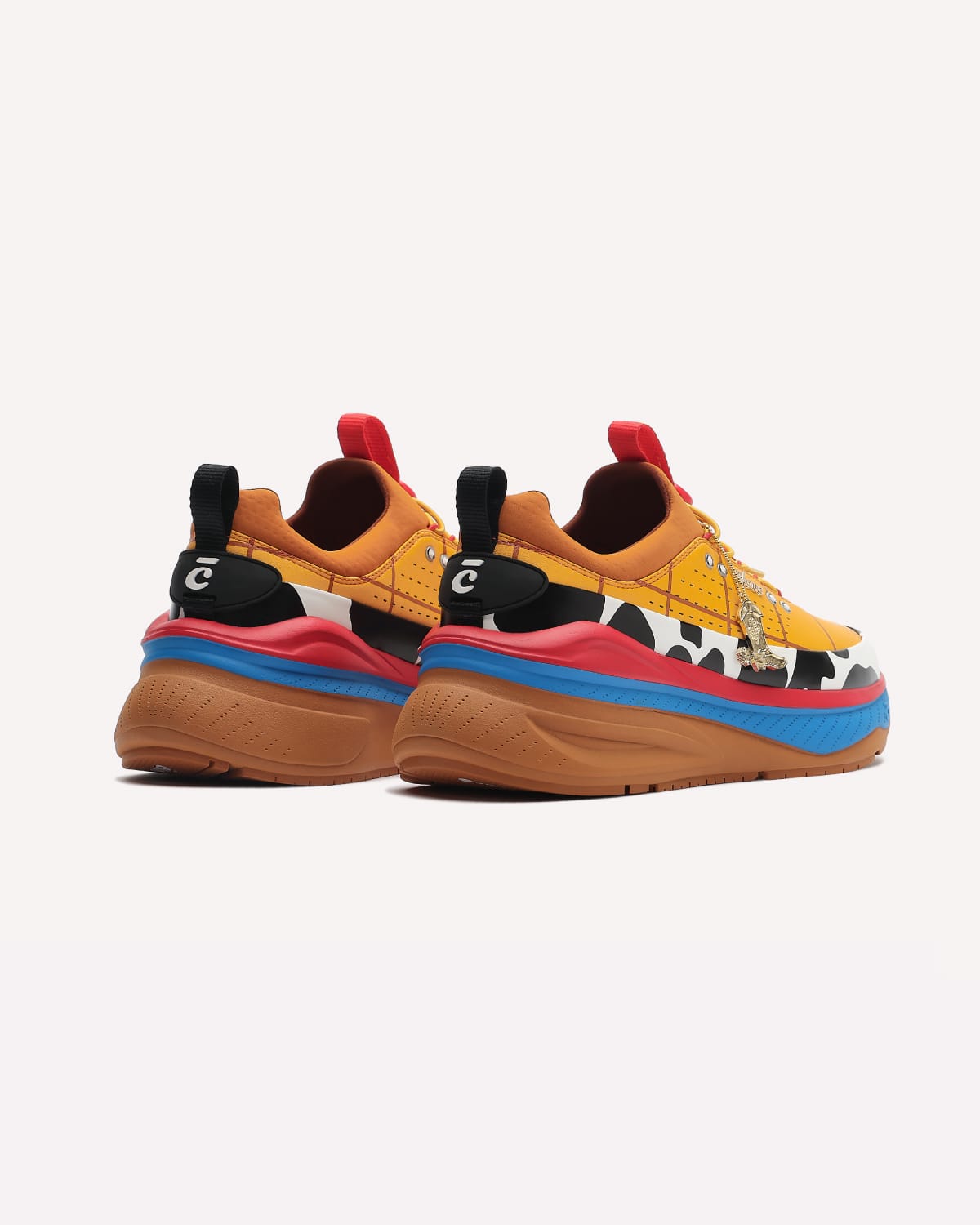 Colorful sneakers with a cartoonish design on a white background
