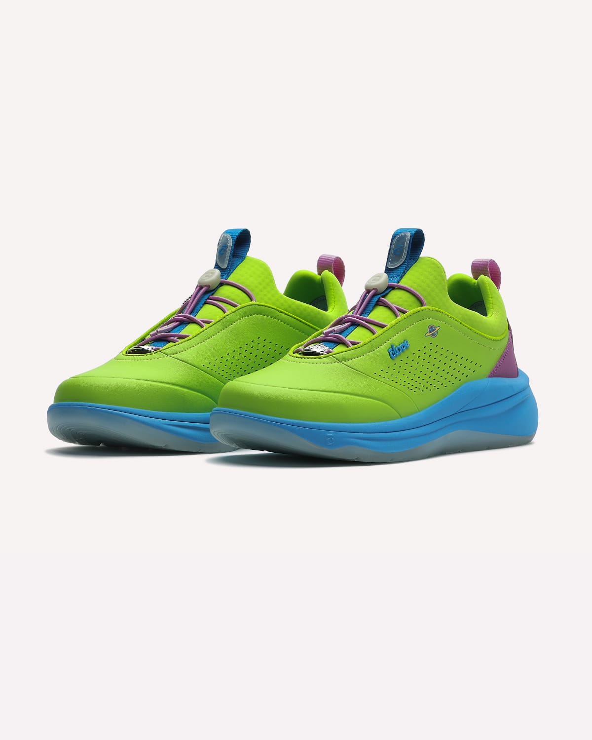 Pair of bright green sneakers with blue bottoms on a white background