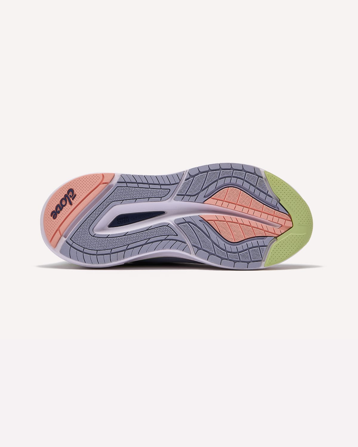 Gray athletic shoe with pink and green accents on a white background