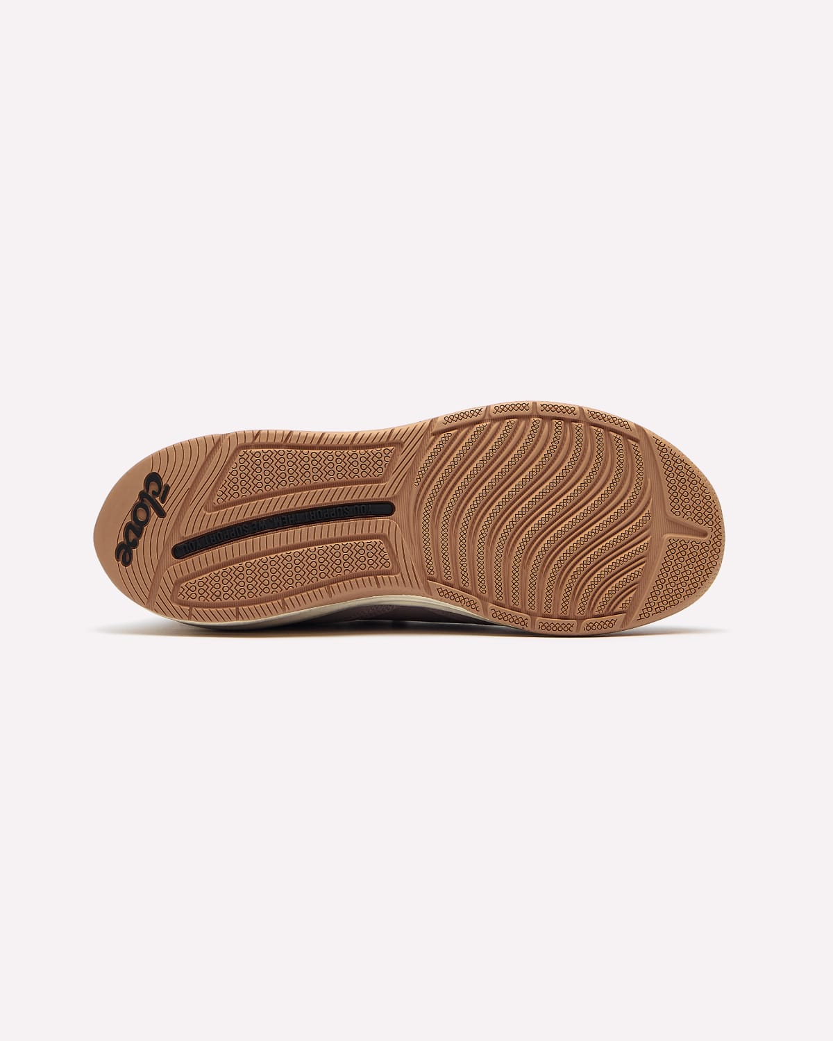 The bottom sole of a shoe in a warm tan or gum rubber color, featuring a black textured grip strip and the brand name 'clove' printed in black on the heel, shown against a plain light gray background.