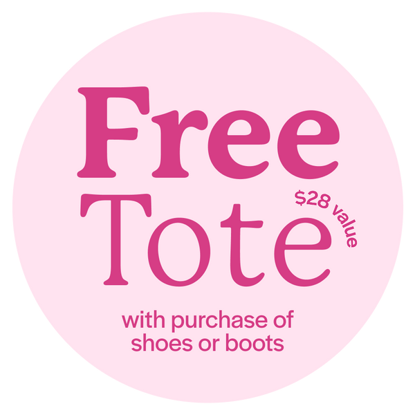 A promotional graphic for a free lunch tote. A light pink circular background contains the text 'Free Lunch Tote' in dark pink, '$28 value' next to a white tote bag with bright pink handles and base, and 'with purchase of shoes or boots' at the bottom.