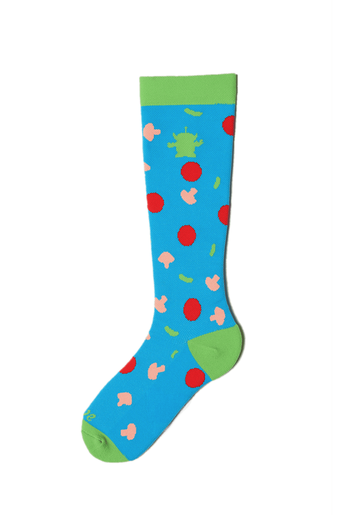 Colorful knee-high sock with floral pattern on a green background
