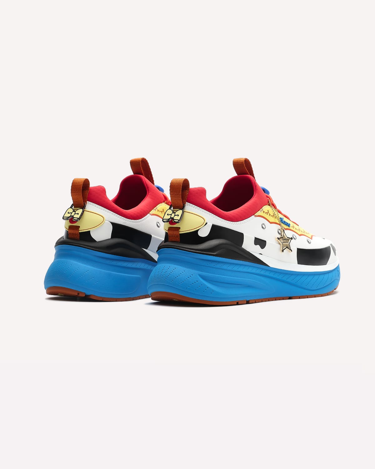 Colorful sneakers with cartoon character design on a white background