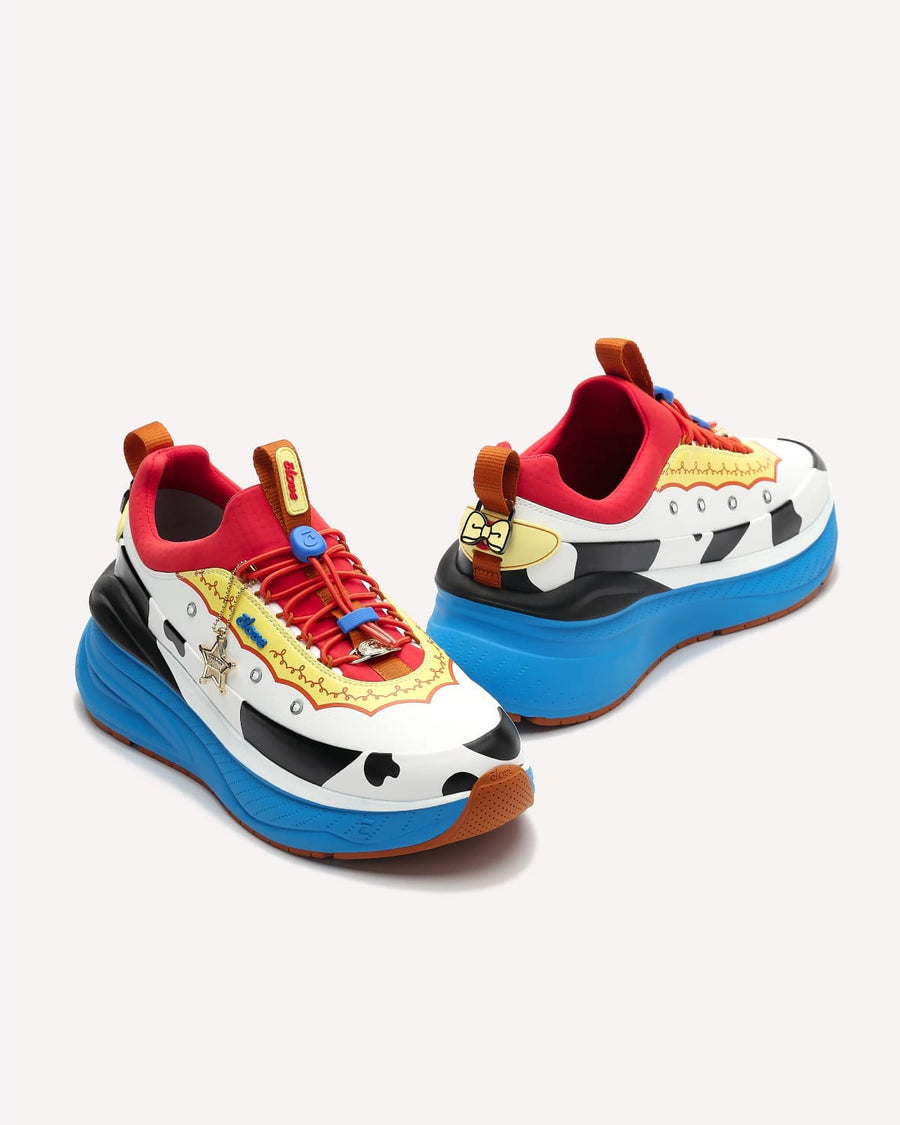 Colorful sneakers with cartoon design on a white background