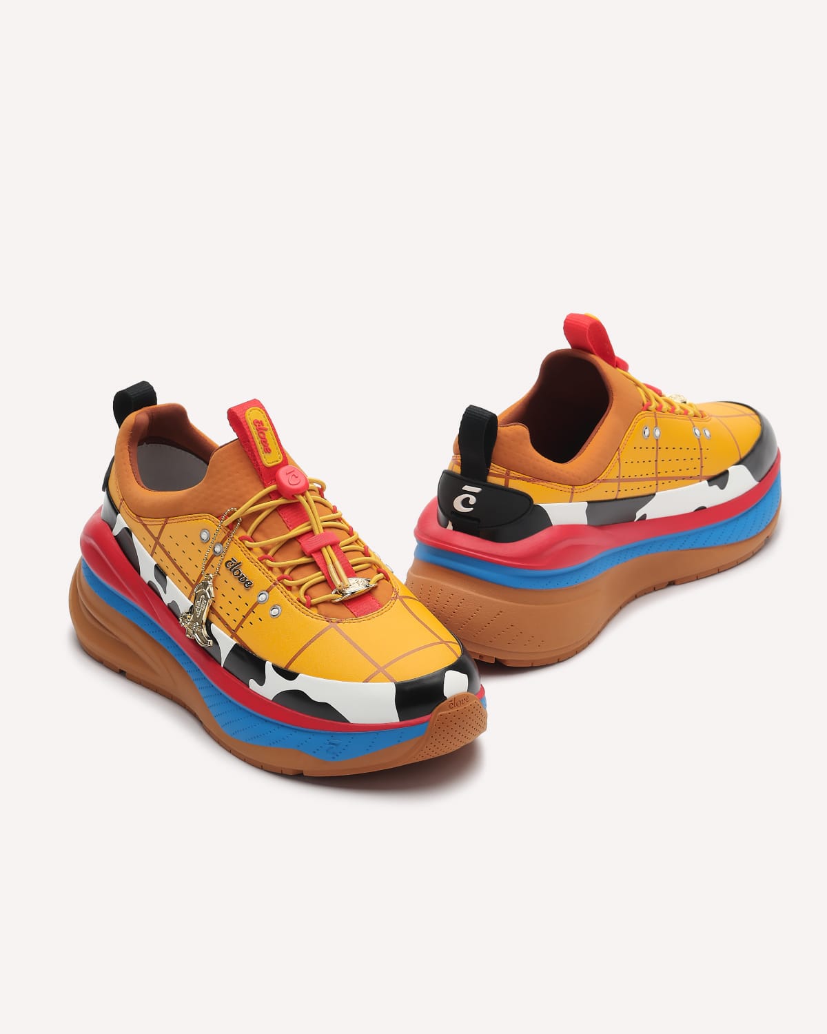 Colorful sneakers with a cartoon character design on a white background