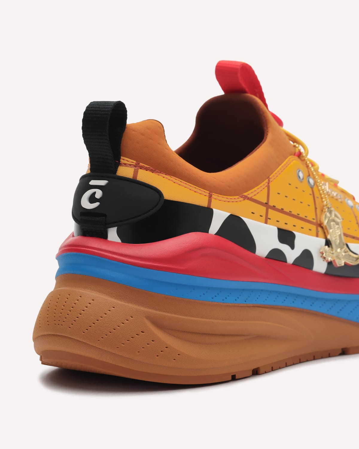 Multicolored sneaker with a unique design on a white background