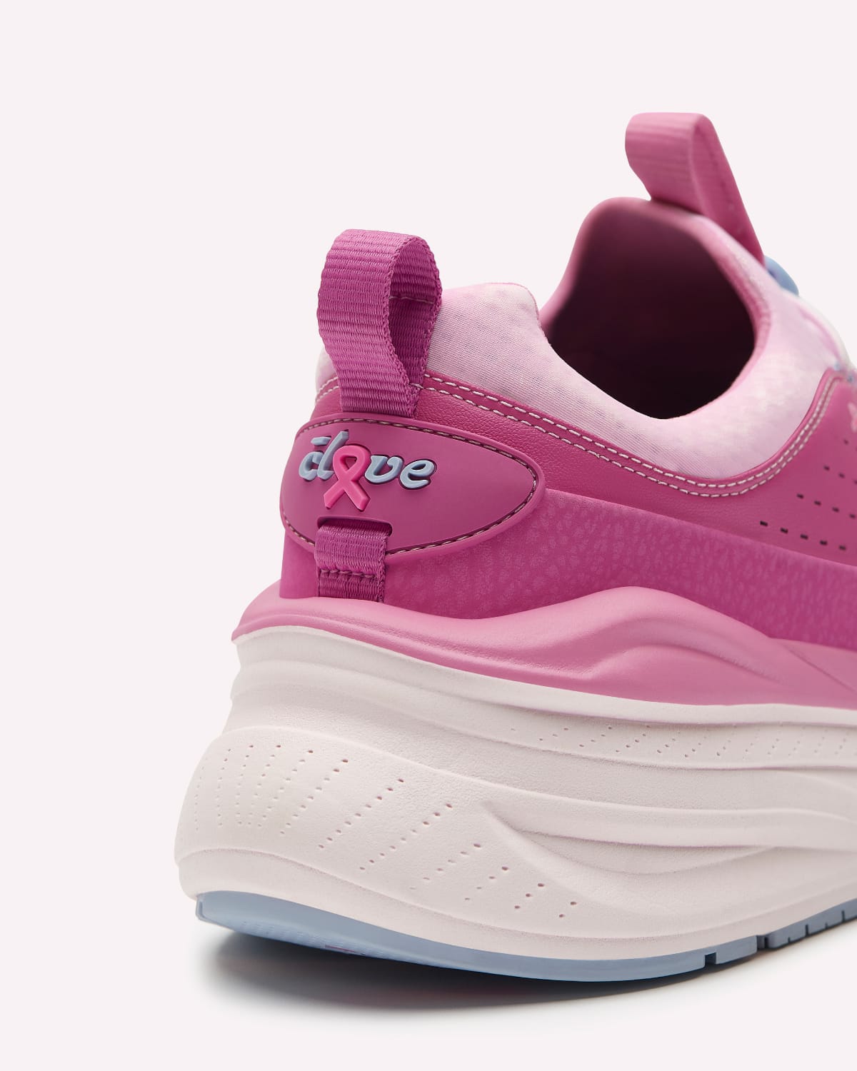 A close-up of a pink and white athletic sneaker, showing the heel and side profile. The shoe features a textured pink upper, a thick white platform bottom, and a pink ribbon logo with the word 'clove' on the heel.