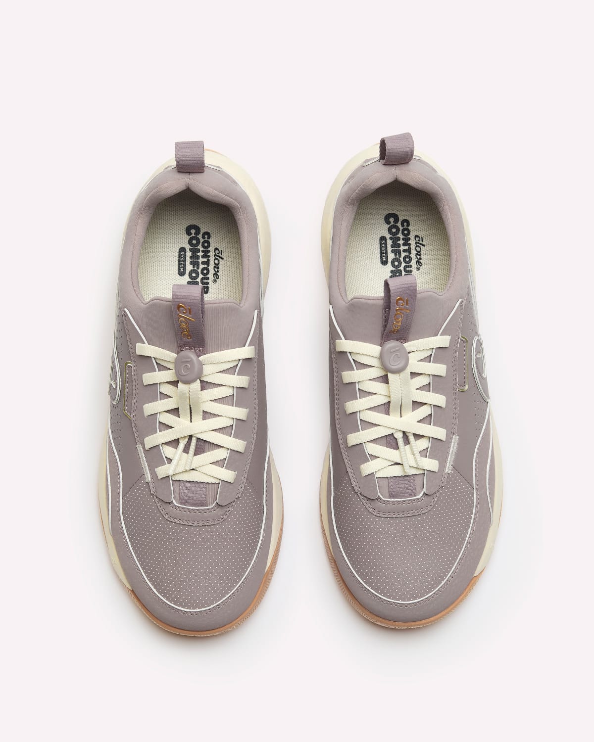 A pair of low-top sneakers shown from a top-down view on a light gray background. The sneakers feature a dusty lavender-gray mesh and synthetic upper, cream-colored laces, white piping, and a gum-colored bottoms.